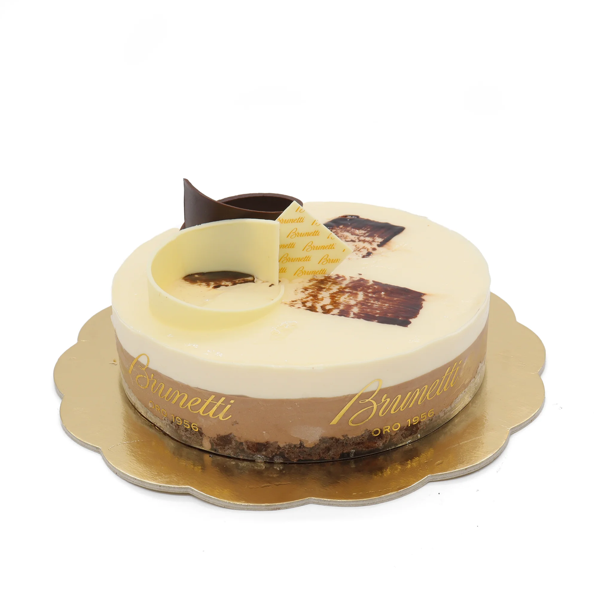 A decadent Cookies and Cream Cheesecake on a gold plate.