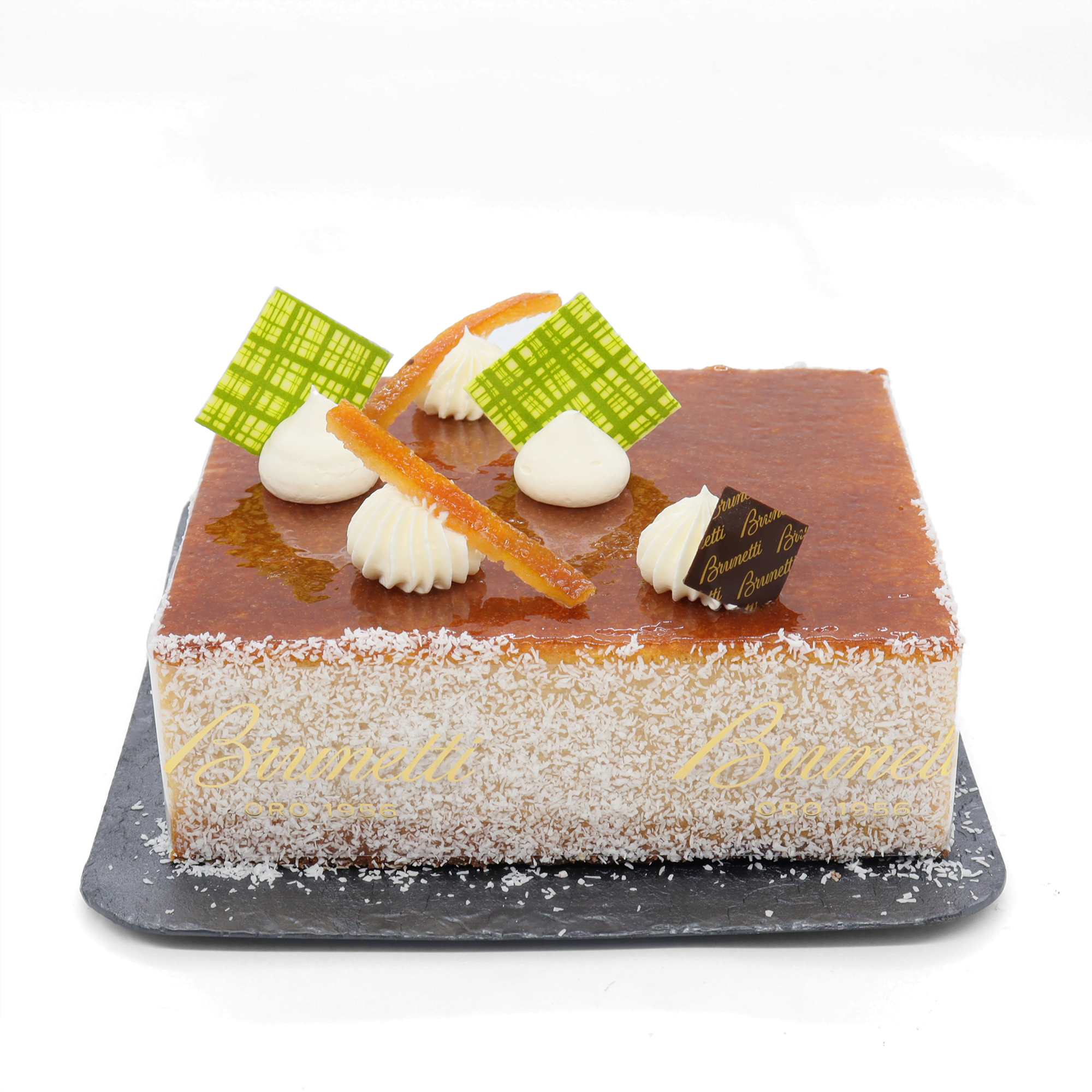 A decadent Cookies and Cream Cheesecake adorns a plate.