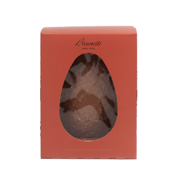 A red brunetti chocolate box with a transparent oval window displaying a large, wrapped chocolate easter egg.