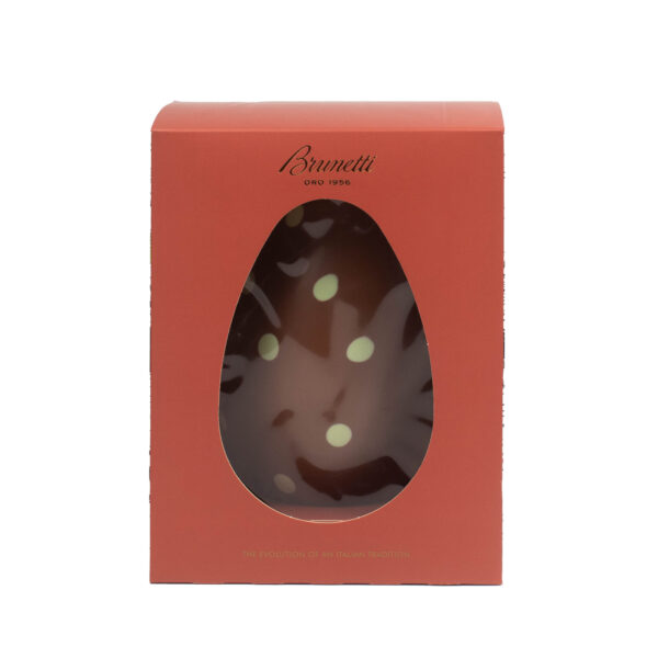 A box of brunetti chocolates with an oval window showcasing chocolates inside, labeled "the evolution of an italian tradition.