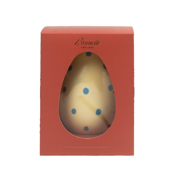 A boxed easter egg by brunetti, with a clear oval window revealing a chocolate egg speckled with blue dots, against a plain white background.