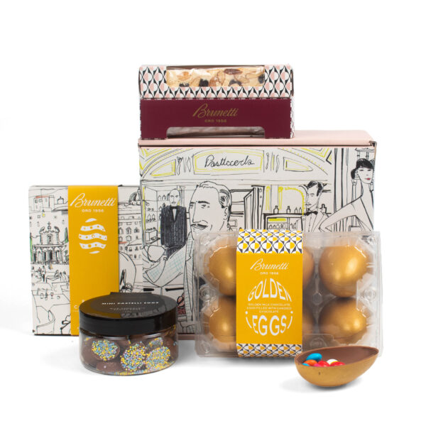 Assorted brunetti chocolate products displayed, including boxes of chocolates, jars, and golden eggs, all featuring elegant packaging.