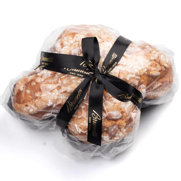 Traditional Colomba Bagged. Wrapped in clear plastic with black ribbons, isolated on a white background.