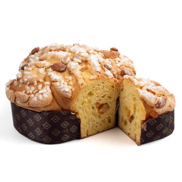 Traditional Colomba Cut shaped like a dove, decorated with almonds and sugar pearls, partially sliced, against a white background.