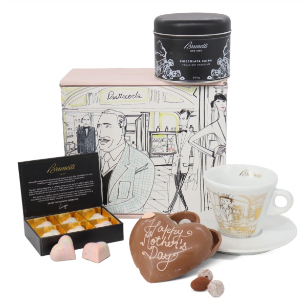 A chocolate-filled Mothers day hamper that includes a cup of coffee.