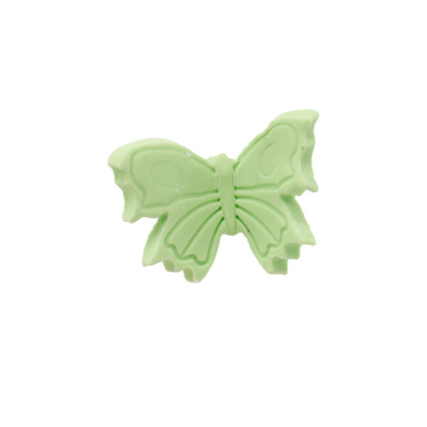 A green butterfly shaped toy on a white background.