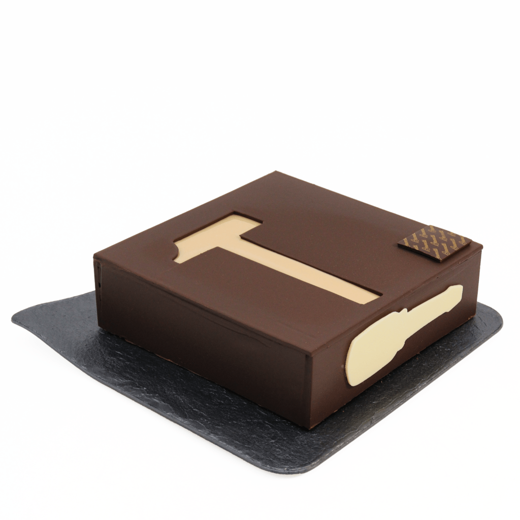 A Torta Ubriaca cake with the letter t on top.