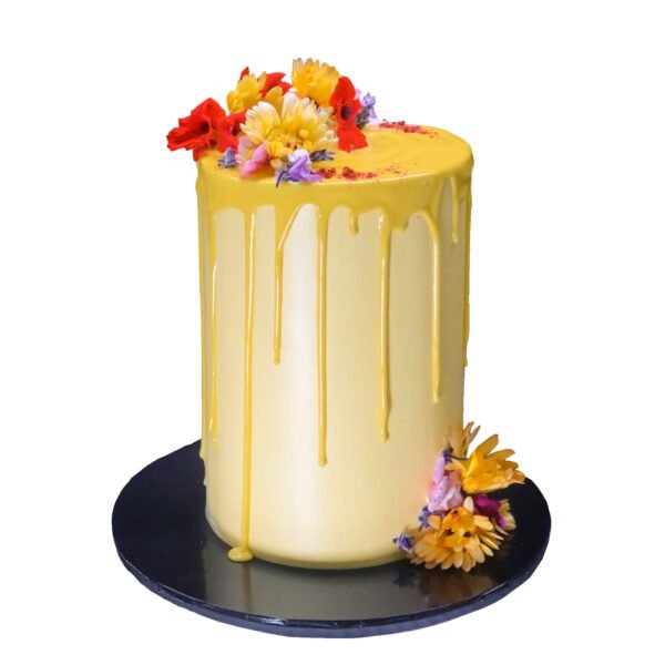 A Freestyle cake with flowers on top.