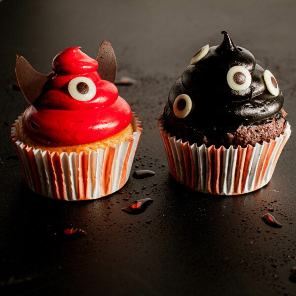 Two Halloween Cupcakes - 4 Pack with eyes on them.