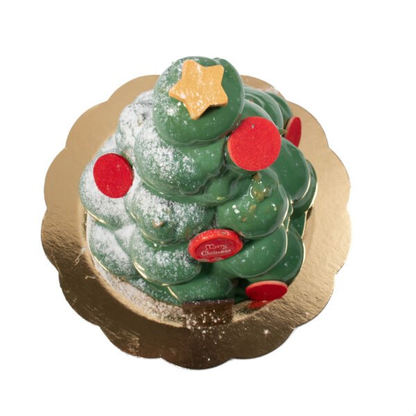 A green Profiterole Christmas Tree on a gold plate.