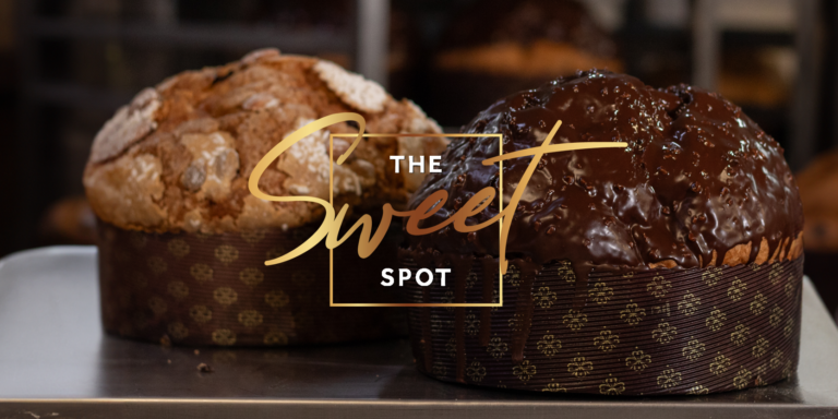 Two artisanal bread loaves on a counter; one dusted with powdered sugar, the other covered in chocolate glaze, with the text "the sweet spot" overlay.