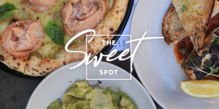 A variety of dishes including pizza with smoked salmon, avocado salad, and a sandwich, displayed with the text "the sweet spot" overlaying the image.