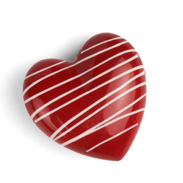 A shiny red heart-shaped chocolate with white stripes, isolated on a white background.