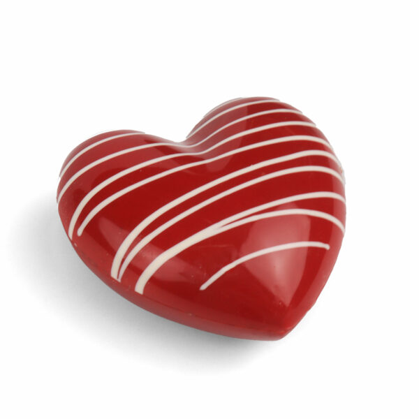 A shiny red heart-shaped chocolate with white stripes, isolated on a white background.