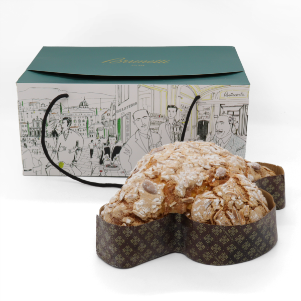 A Traditional Colomba Gift Bag displayed next to a loaf of bread.