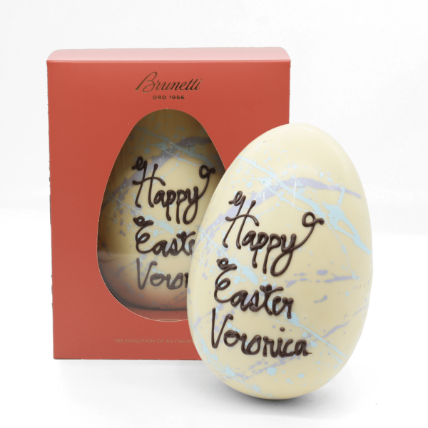 A happy Medium Personalised Egg with "happy easter victoria" words.