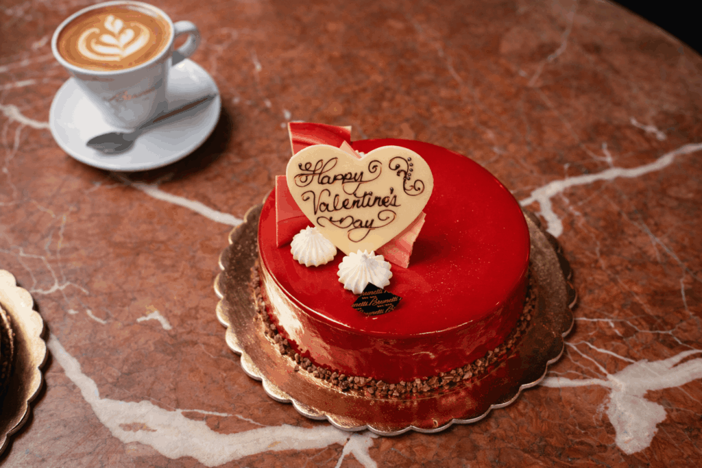 Red Valentine's Day cake with coffee